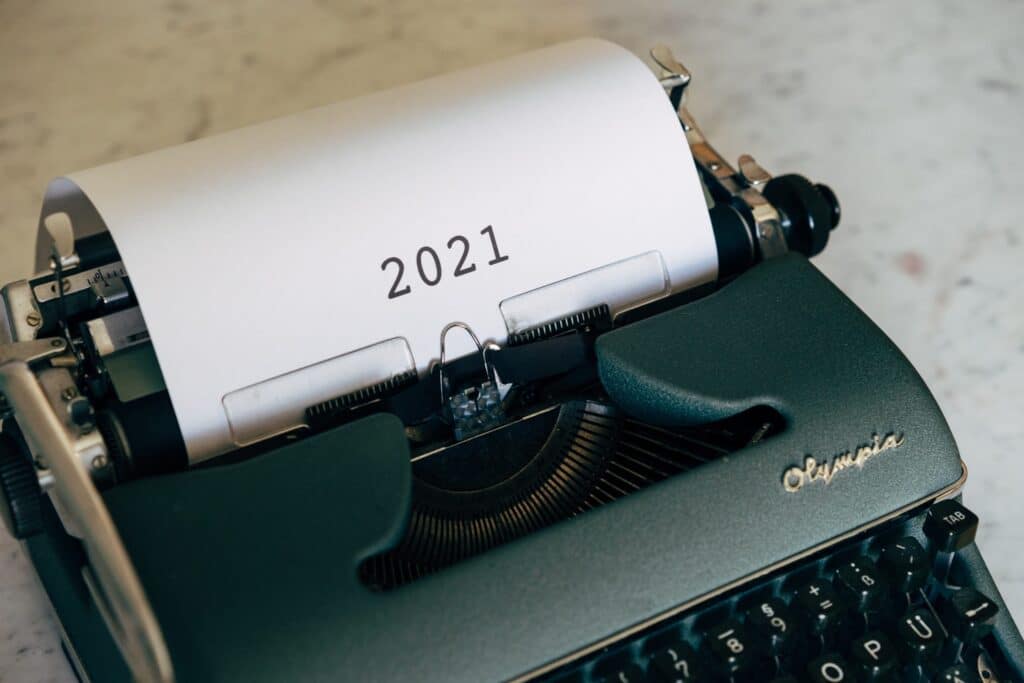 Typewriter with 2021 typed on paper