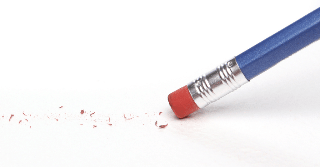 Blue pencil erasing a mistake